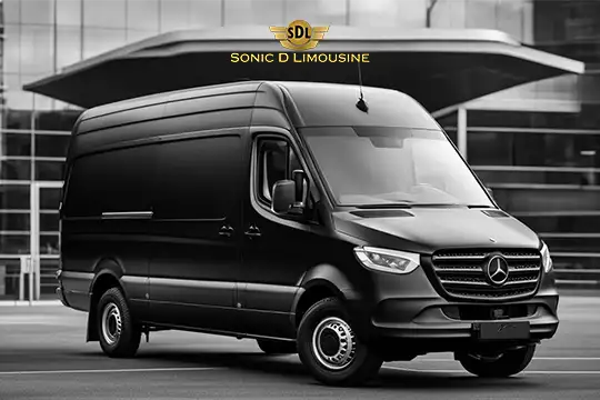 Sonic D Limousine Worldwide Voted Most Reliable Airport Transportation Provider! A black Mercedes-Benz Sprinter van with the Sonic D Limousine Luxury Airport Transportation logo is parked in front of a modern building. Sonic D Limousine Worldwide your luxury Airport Transportation