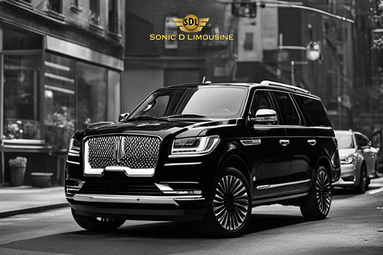 Sonic D Limousine Worldwide Voted Most Reliable Airport Transportation Provider! The black luxury SUV labeled "Sonic D Limousine" drives through an urban street with buildings and traffic lights in the background, exemplifying top-tier luxury airport transportation. Sonic D Limousine Worldwide your luxury Airport Transportation