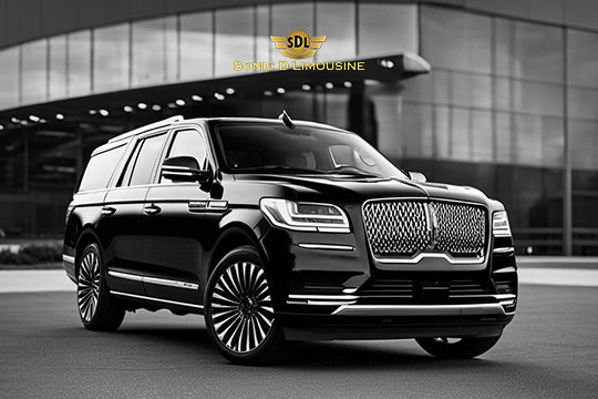 Sonic D Limousine Worldwide Voted Most Reliable Airport Transportation Provider! Black luxury SUV with a sleek design parked in front of a modern glass building. The Sonic D Limousine logo is prominently displayed at the top of the image. Sonic D Limousine Worldwide your luxury Airport Transportation