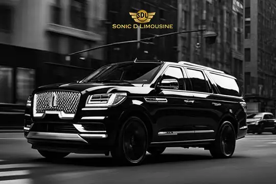 Sonic D Limousine Worldwide Voted Most Reliable Airport Transportation Provider! A black luxury SUV with tinted windows glides through an urban street, proudly showcasing the logo and name "Sonic D Limousine Luxury Airport Transportation" at the top. Sonic D Limousine Worldwide your luxury Airport Transportation